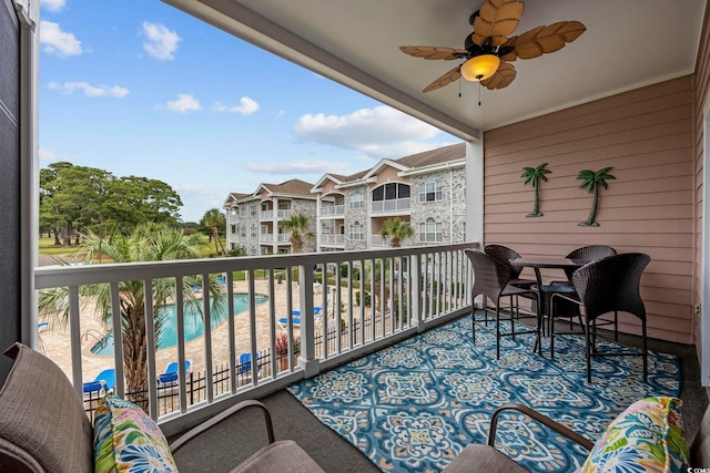balcony featuring ceiling fan