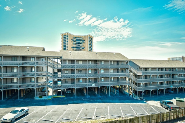 9621 Shore Dr Unit F-117, Myrtle Beach, SC 29572 - view of apartment building / complex featuring uncovered parking