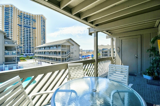 9621 Shore Dr Unit F-117, Myrtle Beach, SC 29572 - balcony featuring outdoor dining space