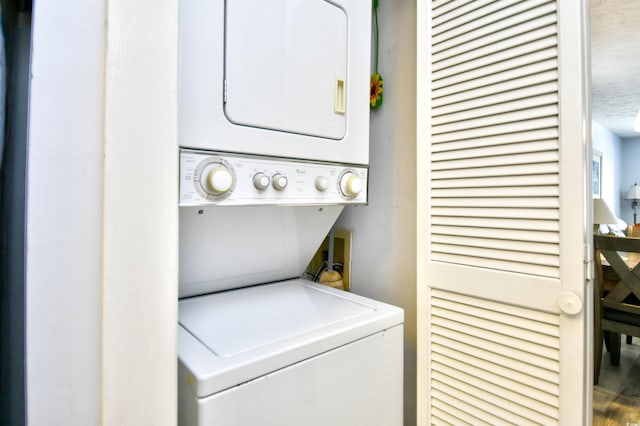 9621 Shore Dr Unit F-117, Myrtle Beach, SC 29572 - washroom with stacked washer / drying machine