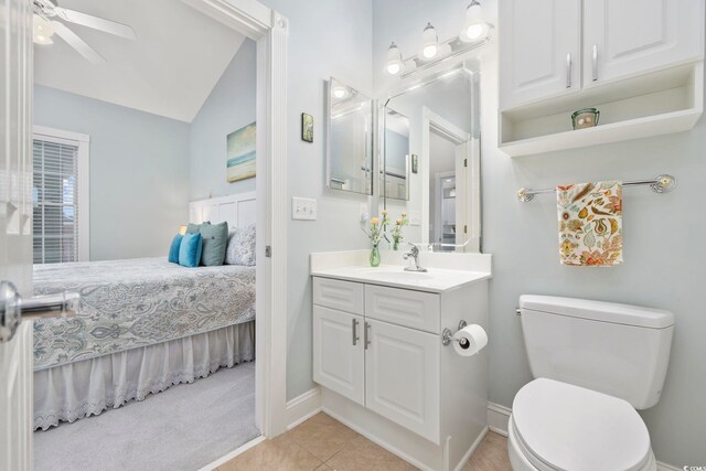 4828 Magnolia Lakes Dr Unit 404, Myrtle Beach, SC 29577 - bathroom featuring ensuite bath, toilet, vanity, vaulted ceiling, and baseboards