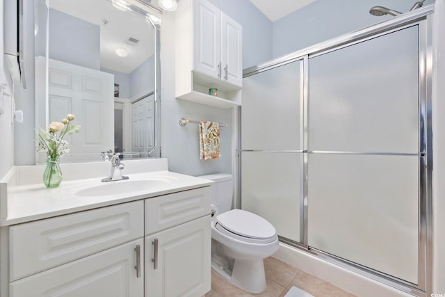 4828 Magnolia Lakes Dr Unit 404, Myrtle Beach, SC 29577 - bathroom with tile patterned floors, a shower stall, toilet, and vanity