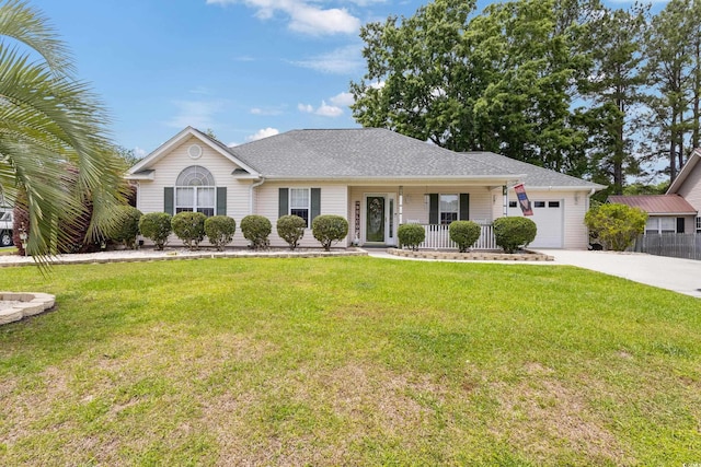 ranch-style house with covered porch, an attached garage, driveway, and a front lawn