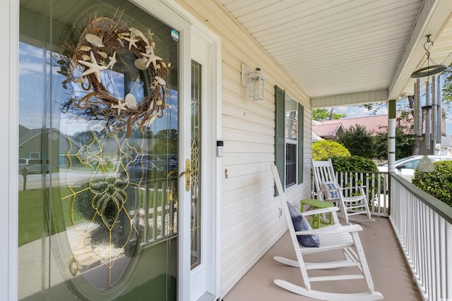 balcony featuring a porch