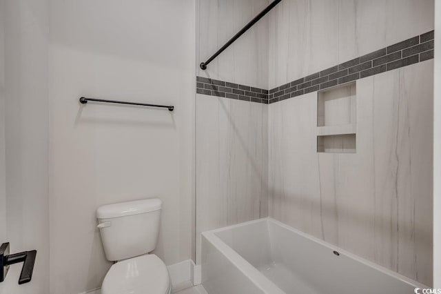 full bath with toilet, bathing tub / shower combination, and baseboards