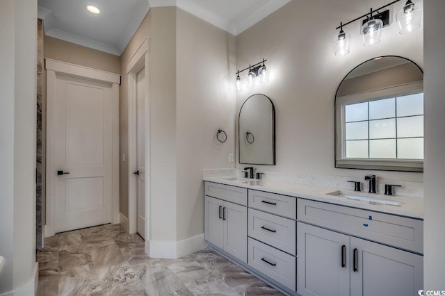 bathroom featuring ornamental molding, marble finish flooring, baseboards, double vanity, and recessed lighting