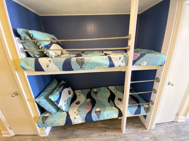 bedroom featuring crown molding