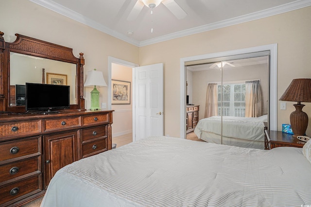 bedroom featuring ornamental molding, a closet, a ceiling fan, and baseboards