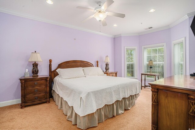 bedroom featuring light colored carpet, recessed lighting, crown molding, baseboards, and ceiling fan