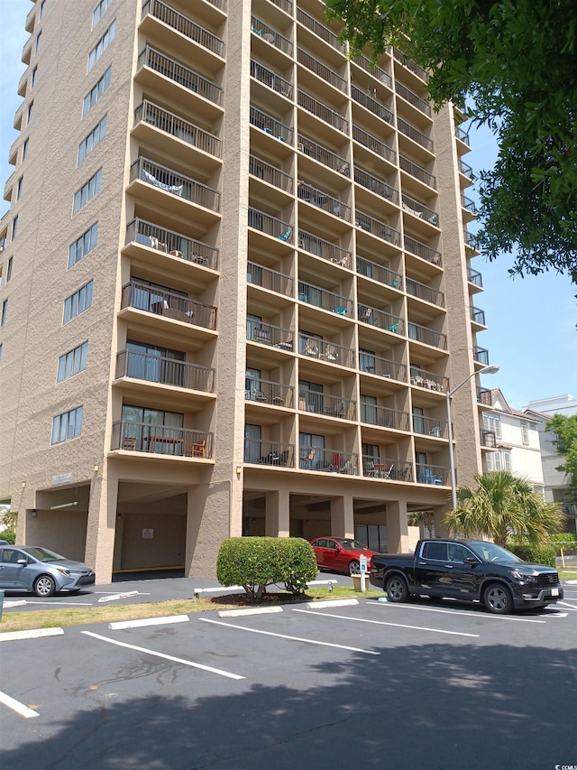 210 75th Ave N Unit 4042, Myrtle Beach, SC 29572 - view of apartment building / complex featuring uncovered parking