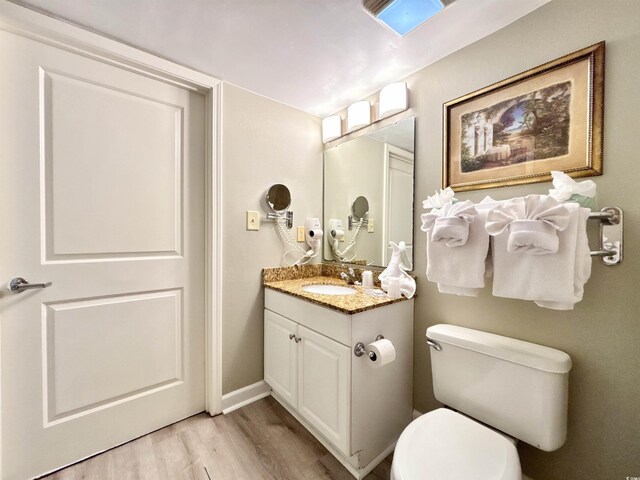 5300 N Ocean Blvd Unit 1102, Myrtle Beach, SC 29577 - bedroom with wood finished floors, a textured ceiling, and baseboards