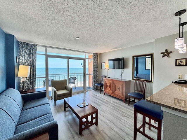 5300 N Ocean Blvd Unit 1102, Myrtle Beach, SC 29577 - community pool featuring a patio