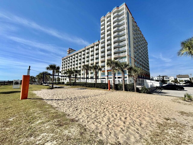 5300 N Ocean Blvd Unit 1102, Myrtle Beach, SC 29577 - kitchen featuring black appliances, a sink, and brown cabinets