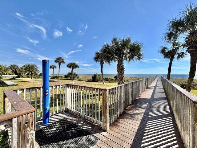 5300 N Ocean Blvd Unit 1102, Myrtle Beach, SC 29577 - living room featuring a textured ceiling, light wood-style floors, and expansive windows