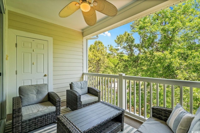 balcony featuring a ceiling fan