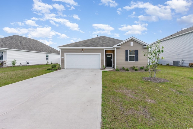 single story home featuring central AC, a garage, concrete driveway, and a front yard