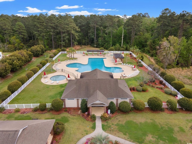 480 Dandelion Ln, Myrtle Beach, SC 29579 - community pool with a view of trees, a hot tub, and a patio area