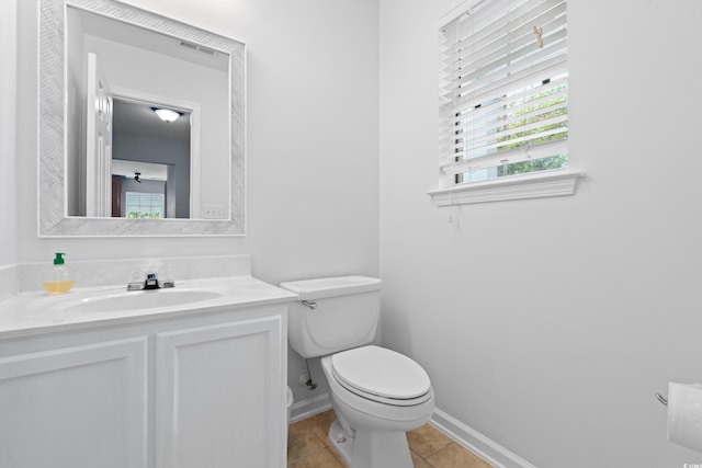 480 Dandelion Ln, Myrtle Beach, SC 29579 - half bath with toilet, vanity, tile patterned flooring, and baseboards