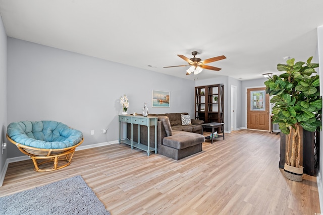 480 Dandelion Ln, Myrtle Beach, SC 29579 - living area with light wood-style floors, baseboards, and a ceiling fan