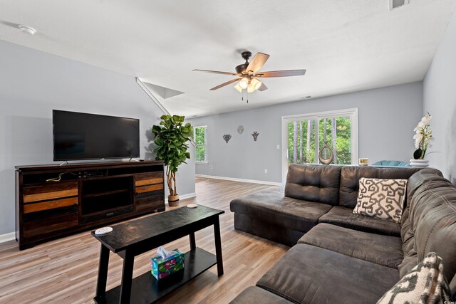 480 Dandelion Ln, Myrtle Beach, SC 29579 - living room with a ceiling fan, baseboards, and light wood finished floors