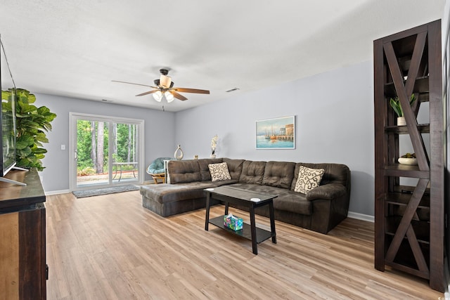 480 Dandelion Ln, Myrtle Beach, SC 29579 - living room with ceiling fan, light wood-style floors, and baseboards