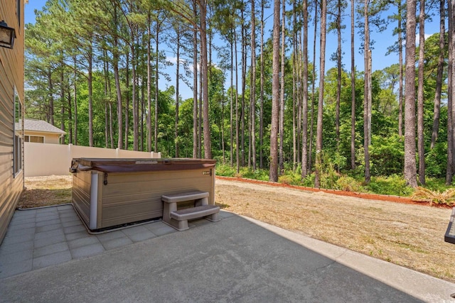480 Dandelion Ln, Myrtle Beach, SC 29579 - view of patio with a hot tub and fence