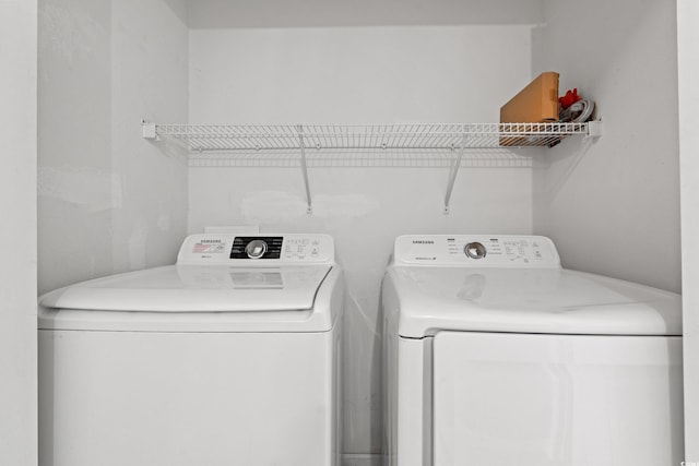 480 Dandelion Ln, Myrtle Beach, SC 29579 - clothes washing area with washing machine and dryer