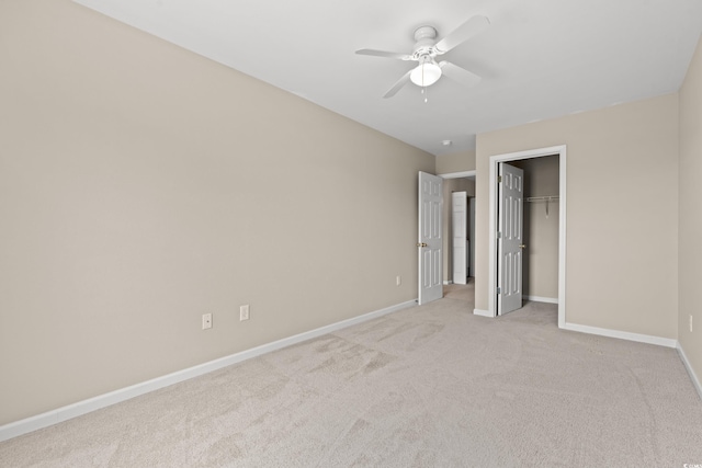 480 Dandelion Ln, Myrtle Beach, SC 29579 - unfurnished bedroom with light carpet, baseboards, a closet, and a ceiling fan