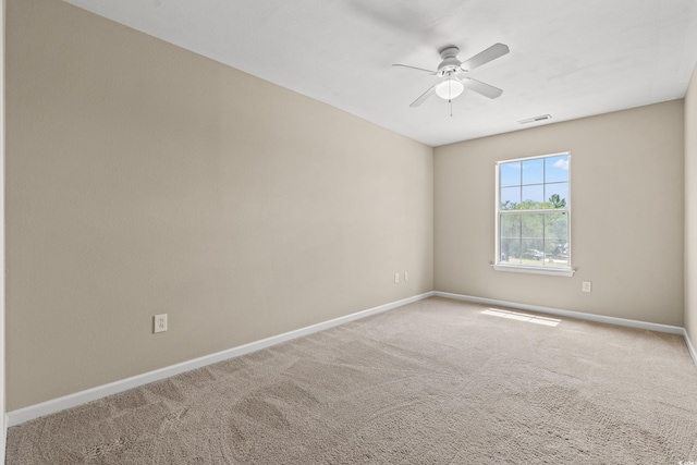 480 Dandelion Ln, Myrtle Beach, SC 29579 - spare room with baseboards, ceiling fan, and carpet flooring