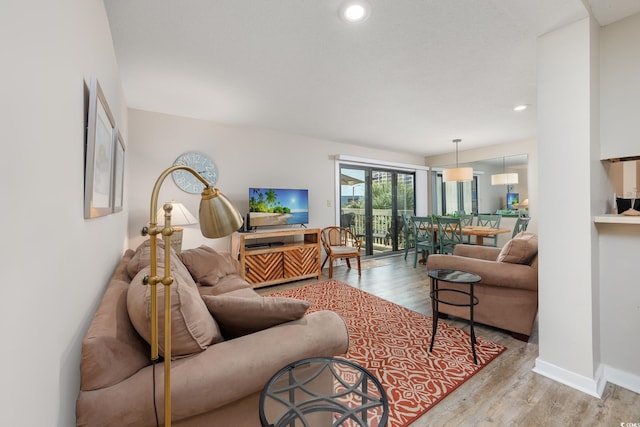 9661 Shore Dr Unit B-3, Myrtle Beach, SC 29572 - living room with wood finished floors, recessed lighting, and baseboards