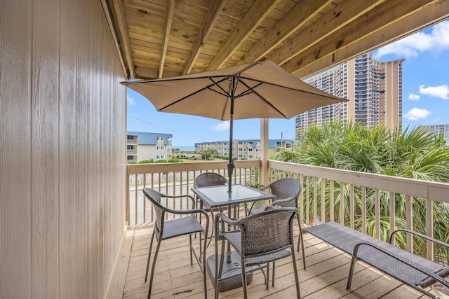 9661 Shore Dr Unit B-3, Myrtle Beach, SC 29572 - wooden deck featuring outdoor dining area