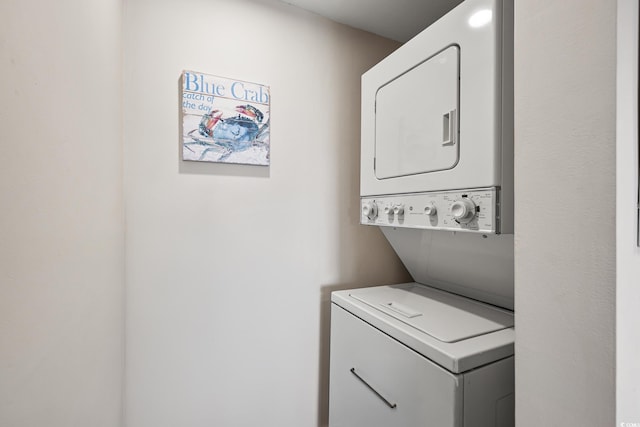 9661 Shore Dr Unit B-3, Myrtle Beach, SC 29572 - washroom with stacked washing machine and dryer