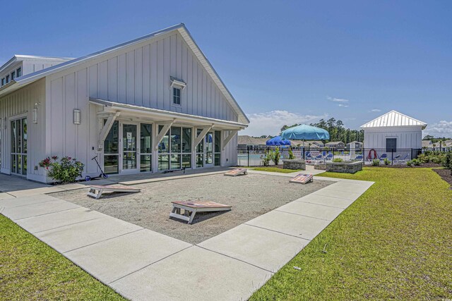 1808 Zodiac Ct, Myrtle Beach, SC 29577 - back of house featuring board and batten siding