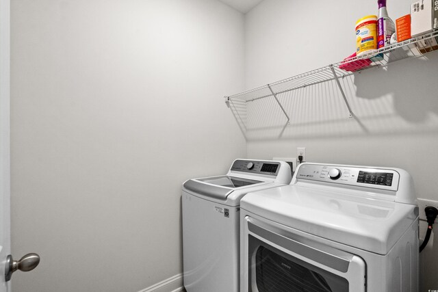 1808 Zodiac Ct, Myrtle Beach, SC 29577 - laundry area with independent washer and dryer and baseboards