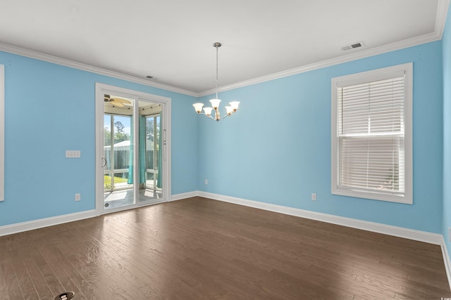 1808 Zodiac Ct, Myrtle Beach, SC 29577 - empty room featuring dark wood-style flooring, baseboards, crown molding, and a chandelier