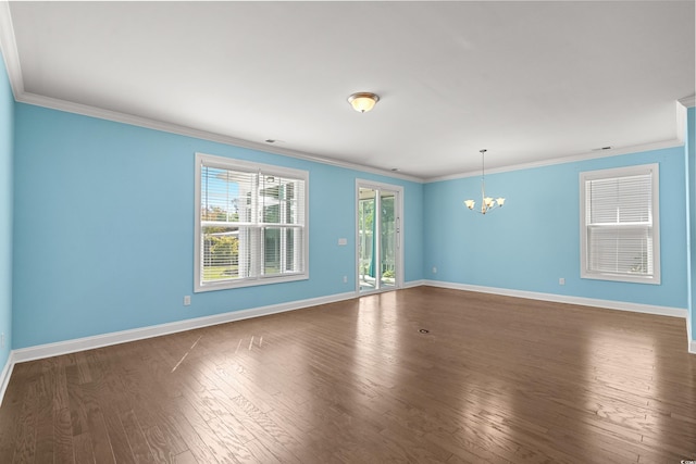 1808 Zodiac Ct, Myrtle Beach, SC 29577 - unfurnished room featuring a chandelier, crown molding, dark wood-style flooring, and baseboards