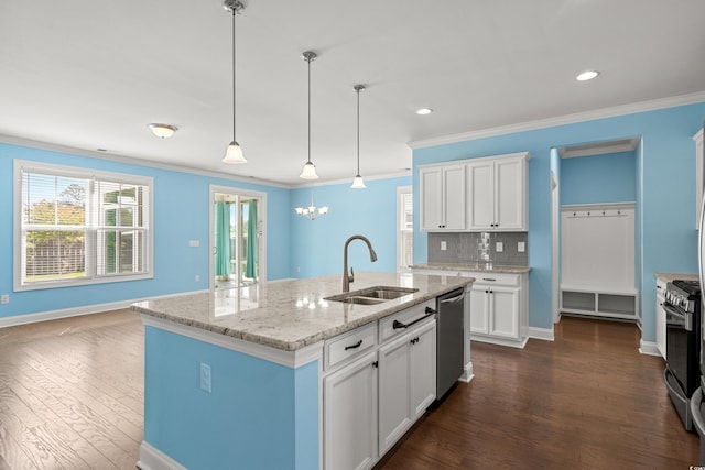 1808 Zodiac Ct, Myrtle Beach, SC 29577 - kitchen with appliances with stainless steel finishes, a sink, dark wood finished floors, ornamental molding, and plenty of natural light