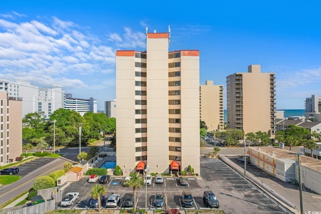 7509 N Ocean Blvd Unit 404, Myrtle Beach, SC 29572 - view of property with uncovered parking and a city view
