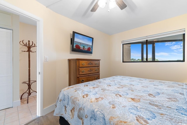 7509 N Ocean Blvd Unit 404, Myrtle Beach, SC 29572 - bedroom featuring a ceiling fan and baseboards
