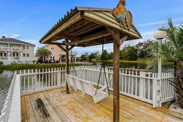 337 59th Ave N, North Myrtle Beach, SC 29582 - wooden deck featuring a water view