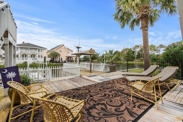 337 59th Ave N, North Myrtle Beach, SC 29582 - wooden terrace featuring fence and a water view