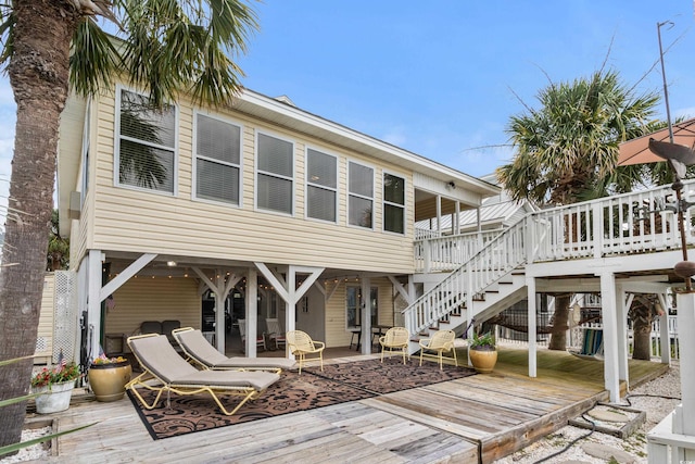 337 59th Ave N, North Myrtle Beach, SC 29582 - rear view of house featuring a deck and stairway