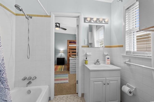 337 59th Ave N, North Myrtle Beach, SC 29582 - bathroom featuring vanity, shower / bath combo with shower curtain, and a ceiling fan