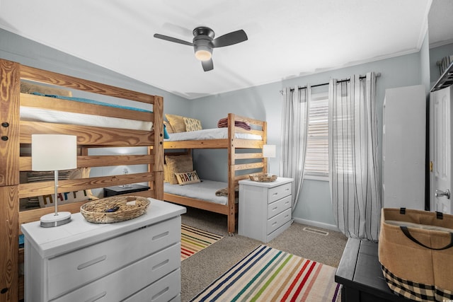 337 59th Ave N, North Myrtle Beach, SC 29582 - bedroom with light colored carpet, ceiling fan, and baseboards