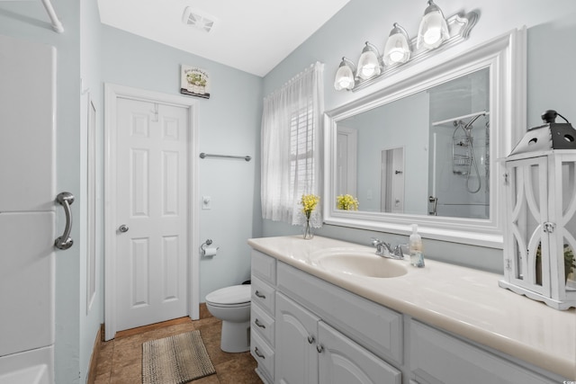 337 59th Ave N, North Myrtle Beach, SC 29582 - bathroom featuring a shower, vanity, and toilet