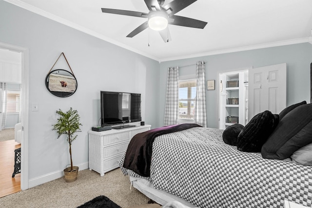 337 59th Ave N, North Myrtle Beach, SC 29582 - bedroom with ornamental molding, baseboards, light carpet, and ceiling fan