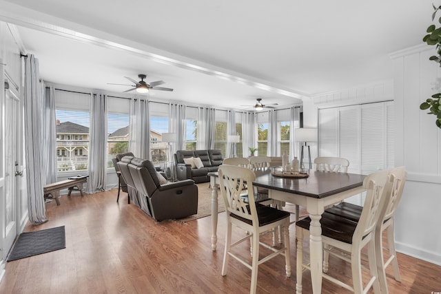 337 59th Ave N, North Myrtle Beach, SC 29582 - dining room with a ceiling fan and light wood-style flooring