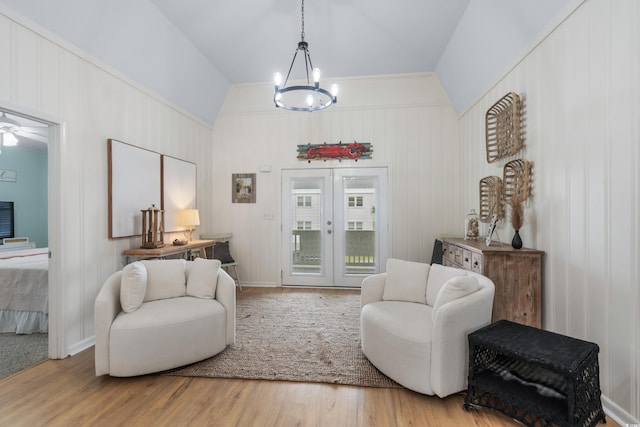 337 59th Ave N, North Myrtle Beach, SC 29582 - sitting room featuring wood finished floors, a chandelier, french doors, and vaulted ceiling