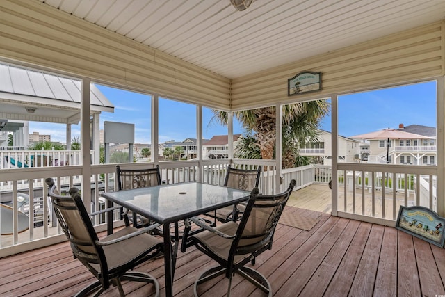 337 59th Ave N, North Myrtle Beach, SC 29582 - sunroom / solarium with outdoor dining area, a residential view, and plenty of natural light