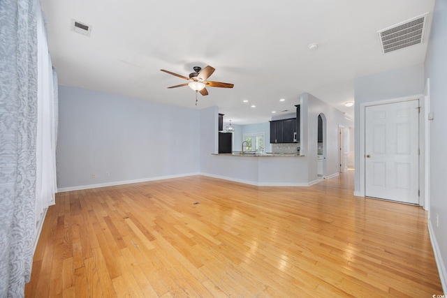 854 Falkirk St, Myrtle Beach, SC 29579 - unfurnished living room featuring a ceiling fan, light wood finished floors, baseboards, and recessed lighting